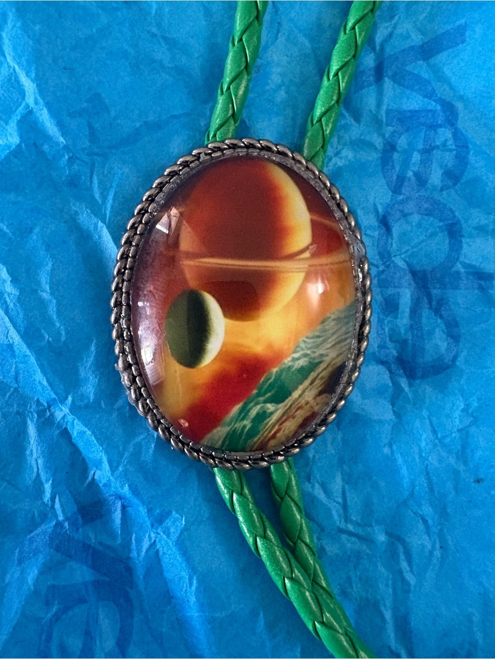 Green Bolo Tie with Orange Planetary Pendant